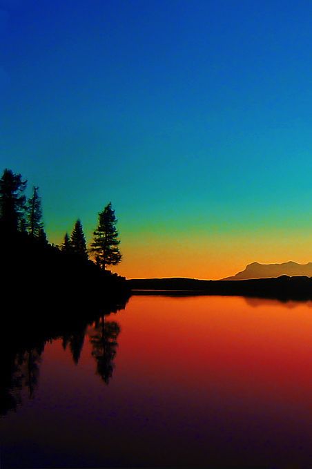 Autumn Sunset in Calaita lake - Trentino, Italy